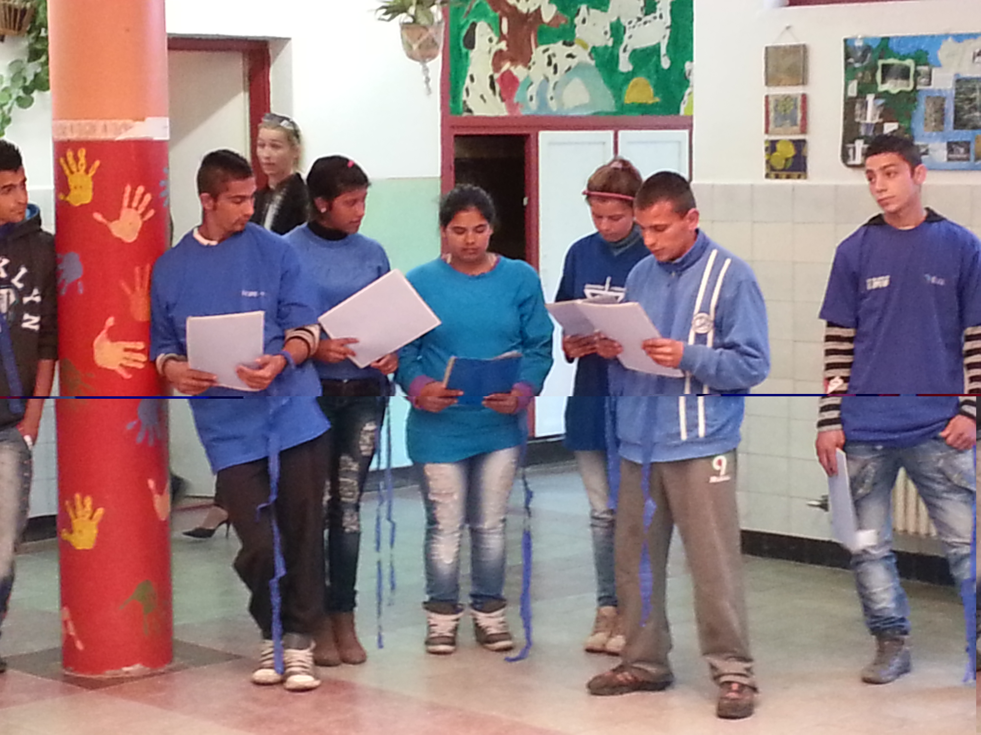 The students weared blue t-shirts, recited the poem of Petőfi (Föltámadott a tenger...)